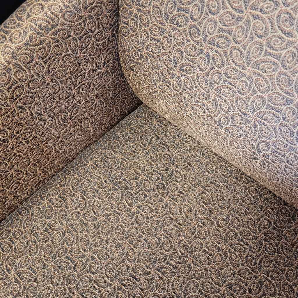 Before cleaning office chair visibly stained in corner.