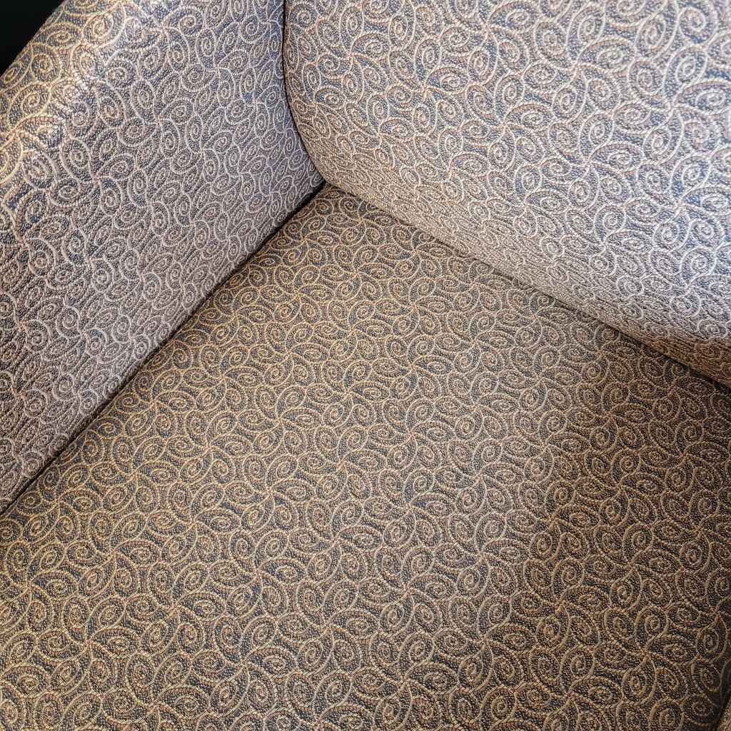 Same office chair after cleaning and removing stain in corner.